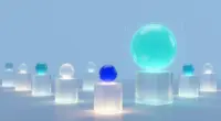 Row of glass pedestals with glowing orbs: a small cobalt orb in the foreground spotlight, a much larger turquoise orb on a pedestal behind it